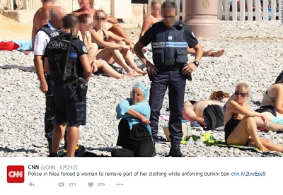 「水着を脱がされる女性の写真」が示す暴力　フェティシズム化するムスリム女性のための水着・ブルキニは、バンドゥビキニか？の画像1